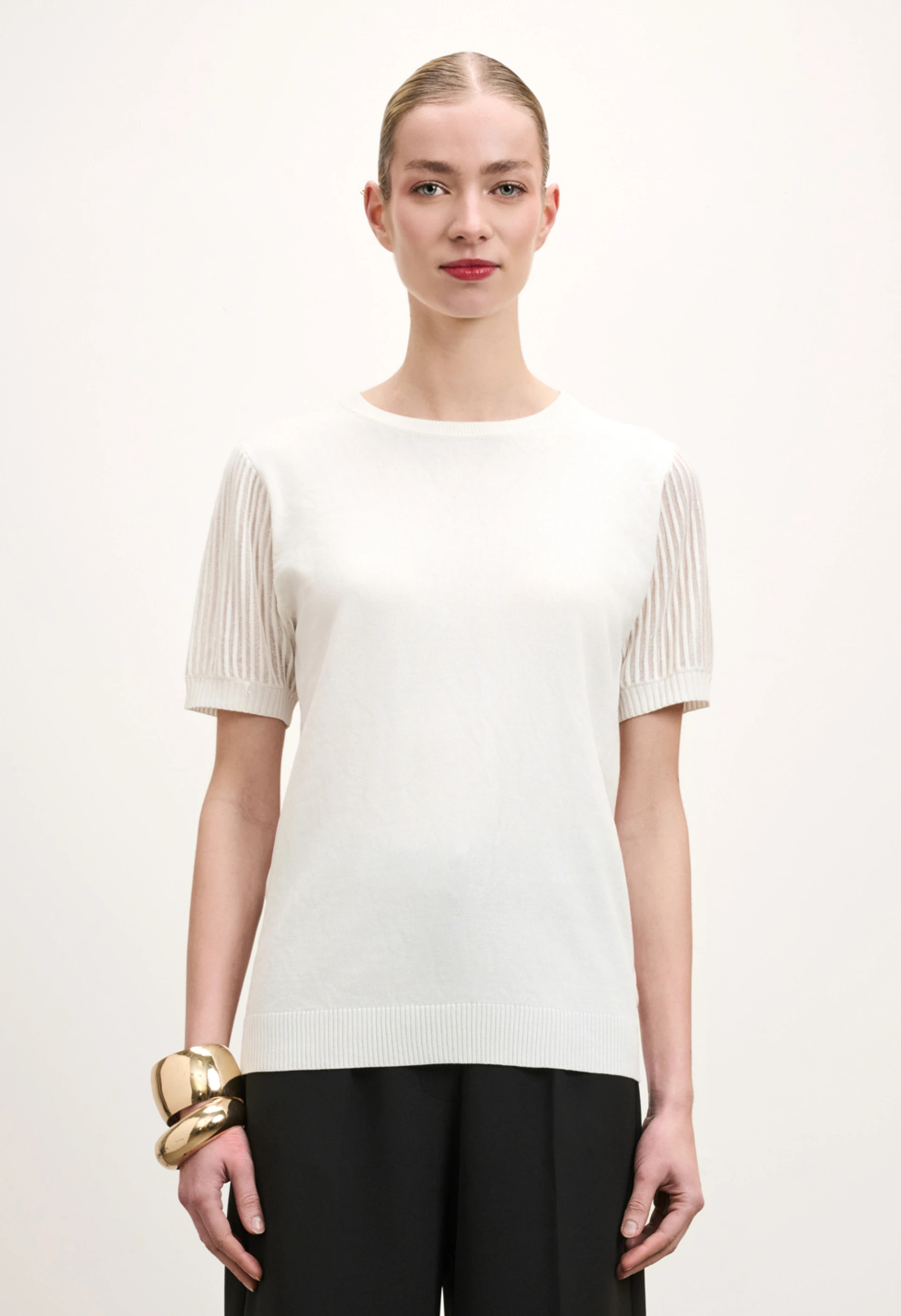 Πλεκτή μπλούζα με διάφανα μανίκια 